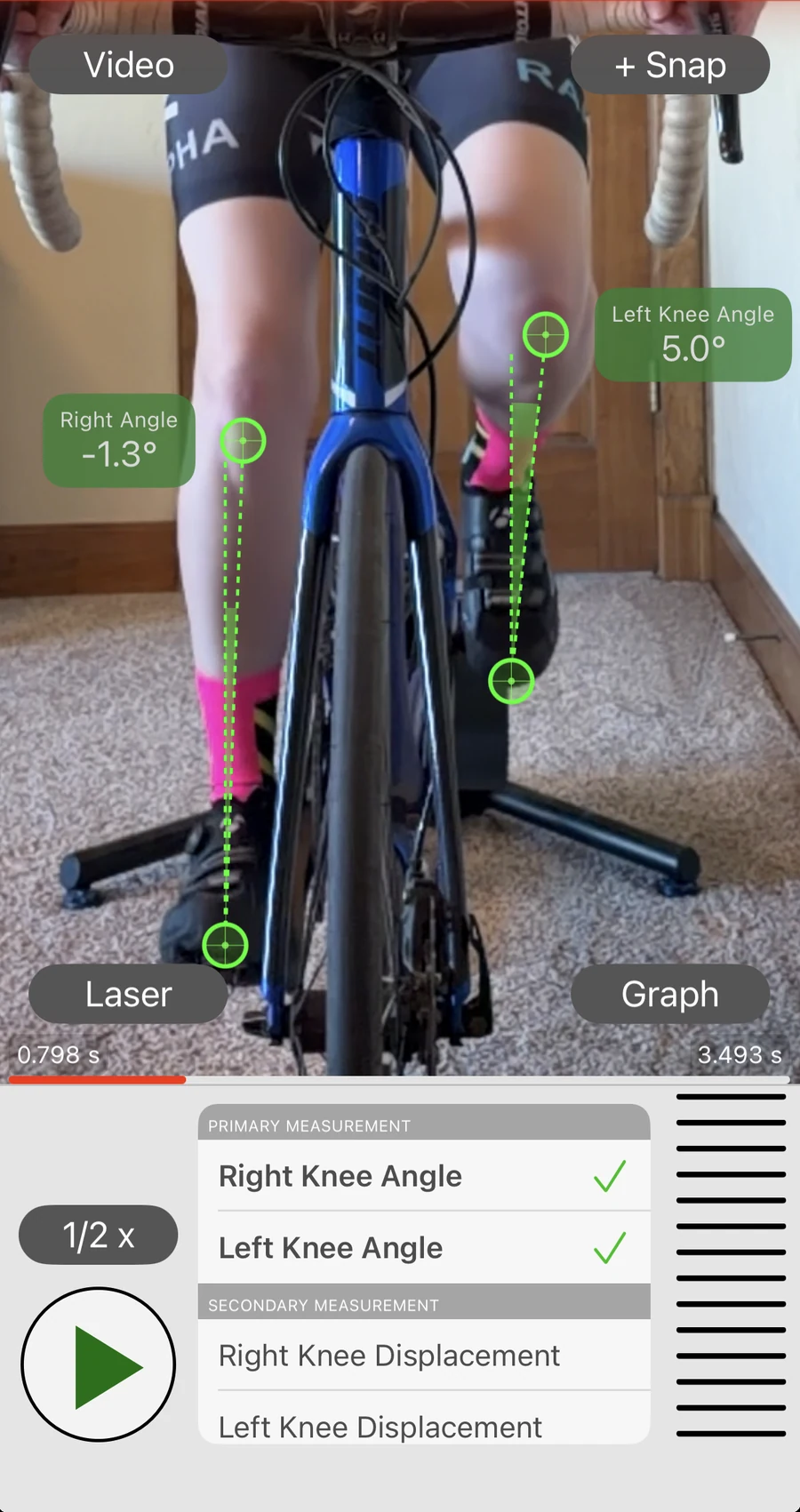 The Bike Fast Fit Elite front-view recording, tracking a rider head-on with left and right knee angles read off each leg
